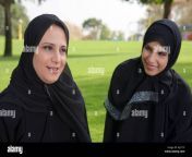 arab mother and daughter smiling together on grass in park ajc11p.jpg from mom arb