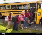 students getting on a school bus bkeghp.jpg from school take