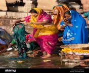 indian hindu pilgrims washing clothes and bathing in the ganges river c8efd2.jpg from desi indian village washing clothes by showing assgla