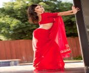 sunny leone red saree side pose sunny leone red saree photoshoot for jism 2 bollybreak com sunny leone hot in jism 2 movie stills 11.jpg from red share sex
