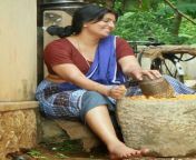 maya viswanath wearing lungi thorthu blouse in aalroopangal movie 485x600.jpg from malayalam extra actress maya viswanath vedi look sexy videos in thandavam malayalam