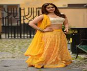 rashi khanna latest hot navel show stills in yellow dress.jpg from rashi noval