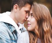 teen boy girl year old looking each other closeup relationship autumn season happiness smiling teenagers outdoors 194867469.jpg from teens up