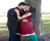 young happy indian couple kissing near tree fall cloudy day 58049180.jpg from desi in indian lovers video