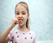 girl child shows her mouth one missing milk tooth holds fallen hands front his bathroom preschool dental care 240371675.jpg from milk 15 mouth drink without