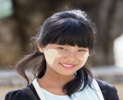 portrait young girl thanaka her smile face happiness myanmar burma mandalay myanmar january unidentified young myanmar 107224511.jpg from myanmar á€™á€½á€”á€»â€‹á€™á€¬