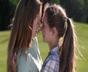 portrait smiling lesbians hugging park close up happy homosexual couple rainbow lgbt flag painted cheeks each other 151222401 jpgw400 from lovers enjoying in park mp4