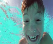 boy pool cute teen dives blue open eyes 38380279.jpg from boiy yoing mp4