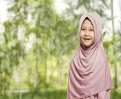 cheerful asian muslim woman wearing hijab standing park 92450619.jpg from asian hijab