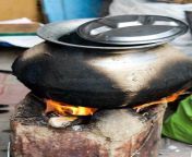 cooking traditional sarson da saag desi style pot coal wood stove indian village india cooking pot 291717380.jpg from oal india desi