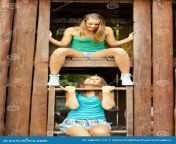 two teenage girls having fun outdoor summer sunny day 54632119.jpg from college young and fun together 2