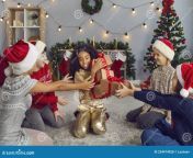 group happy laughing kids giving christmas presents to their stepsister friend group smiling laughing children giving 234474928.jpg from stepsister wants christmas gift