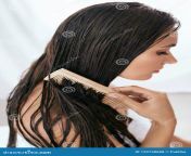 hair care beautiful woman brushing wet long hair bath wooden comb high resolution hair care beautiful woman brushing 129738688.jpg from wet long hair care