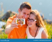 lovers selfie teenage taking sunset lakeside 43295814.jpg from lovers selfie