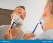 man lots shaving foam his face standing bathroom looking mirror shaving his face beard skincare guy shaving his 130616153.jpg from telugu girls bathroom athulu shaving سکس