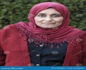 mature muslim woman wearing hijab posing looking to camera 217464005.jpg from 70 old muslim hazi