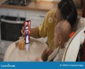 medium shot mom baby having video call dad smartphone mom baby having video call dad 172995574.jpg from vidéo call arab