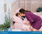 mother giving good night kiss to sleeping son lovely mother putting son to bed mother kissing baby bed mother sleeping 117658507.jpg from jpxxx mother and son sex scenceের ন