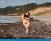 naked girl outdoors enjoying nature beautiful young nude woman walking beach lady nude perfect body nudist 88526401.jpg from naked enjoying full body