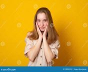 portrait beautiful shy young girl isolated yellow background beautiful shy young girl isolated yellow background 218286115.jpg from view full screen beautiful shy assamese angry married boob pressed by hubby with talk mp4