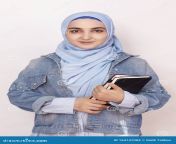 portrait cute muslim businesswoman attractive muslim student holding notepads lovely muslim girl traditional islamic hijab 164147004.jpg from muslim videoद
