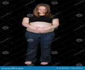 pregnant woman making heart shape bare belly 22406340.jpg from pagnat deley bare