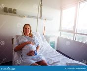 smiling pregnant woman lay hospital bed smiling pregnant woman lay hospital bed catheter hand view above 220704395.jpg from hospital preagnant