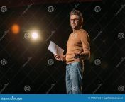 actor holding scenario standing stage rehearse theater mature actor holding scenario standing stage 175921555.jpg from mature actor