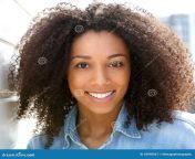 beautiful young black woman smiling close up portrait 45990567.jpg from beautiful young