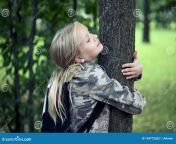childn embracing tree environmental protection outdoor nature conservation outdoors children 144772630.jpg from childn