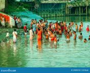 devotees taking holy bath river ganges kolkata india january india family taking bath water ganga kumbh mela 129895193.jpg from holy bath
