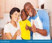 family thumbs up happy young african giving kitchen 63084368.jpg from family guy paheal thumbs jpg