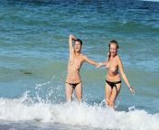 640px topless women at the shore.jpg from topless
