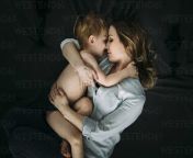 overhead view of mother and son sleeping on bed at home cavf59795.jpg from www mom sleeping son pics