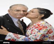 indian old couple wife kissing husband on cheek mr a1md4j.jpg from mature indian couple kissing and fondling on cam