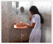nimtala1.jpg from indian village aunty toilet on open area hidden