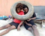 two suspected female thieves apprehended beaten to pulp and almost set ablaze in onitsha photos.jpg from female thieves in nigeria having things inserted in their private parts