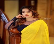 malavika menon in yellow saree with black blouse photos 006.jpg from malavika hot in yellow saree malavika hot vertical scenes from tamil actress malavika hot sexy saree iduppu bed scenes watch