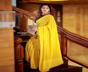 actress malavika menon s stunning makeover in yellow saree for inaugural function in kannur 166600053670.jpg from malavika hot in yellow saree malavika hot vertical scenes from tamil actress malavika hot sexy saree iduppu bed scenes watch