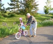 child learns bike ride without training wheels petit early learning journey.jpg from step daughter learning to ride c
