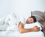 the handsome man sleeping on the bed on the white background picture id1077191096.jpg from house sleeping