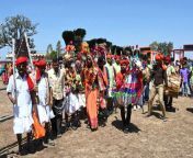 adivasi tribal men faces and bodies decorated wearing ornate headgear dancing to celebrate holi festival kavant gujarat india asia rhplf16068.jpg from gujarat adivasi