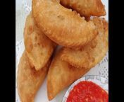 ramzan special curry puff recipe in pashto deep fried pastries with curried potatoes karipap.jpg from fry 99 com pashto pathan pron