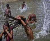  85311594 f1126cab 1d9f 4b46 92e6 212d325318ab.jpg from kumbh snan indian women bath wet nipple