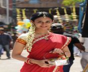 7703d8492b89d353b30323a5173b4e95.jpg from tamil actress aishwarya arjun half yellow saree premabrahaa photo white screen
