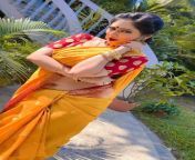 reema woharah sexy navel in orange saree mp4 snapshot 00 17 846.jpg from hot indian aunty reema mp4