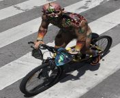 14549686 7119447 a cyclist in mexico city paints his body in a traditional day of a 2 1560069433704.jpg from biqle naked bo