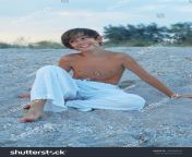 stock photo evening on the azov sea happy boy on the beach 160968629.jpg from nudist azov