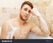 stock photo handsome man taking a bath and enjoying it 342209294.jpg from man taking a bath