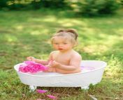 happy toddler girl takes milk bath with petals little girl milk bath bouquets pink peonies baby bathing hygiene care young children 192420 4333.jpg from ♥breastfeeding ♥ ✔after he takes a bath